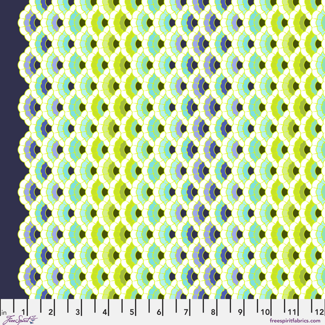 Patterned fabric swatch with geometric design in green, blue, and black on a navy background.