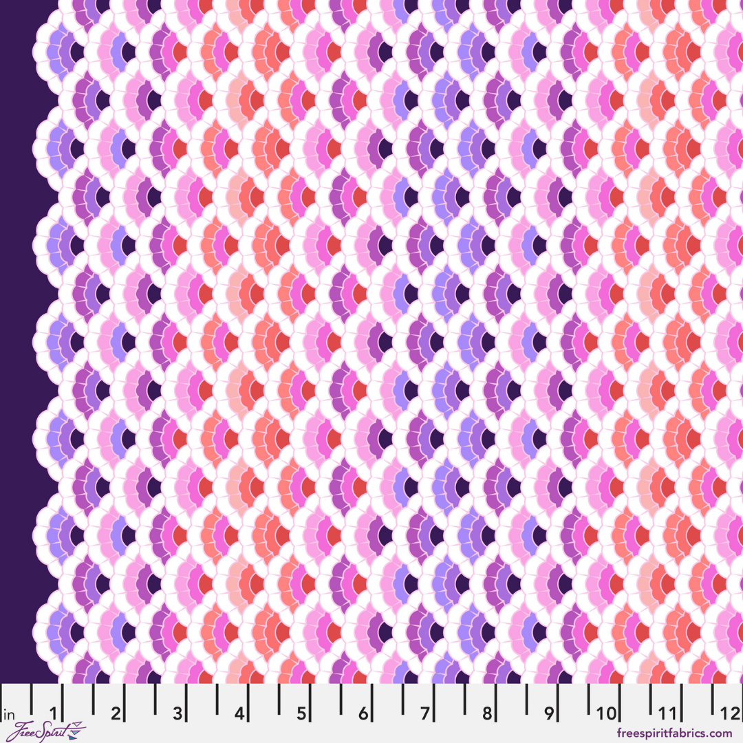Patterned fabric with geometric design in pink, purple, and red on a purple background.