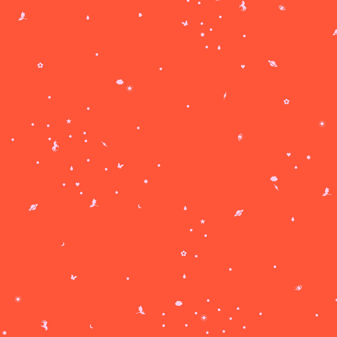 Fabric swatch with a tiny tossed print filled with little magical icons on a bright coral-orange background