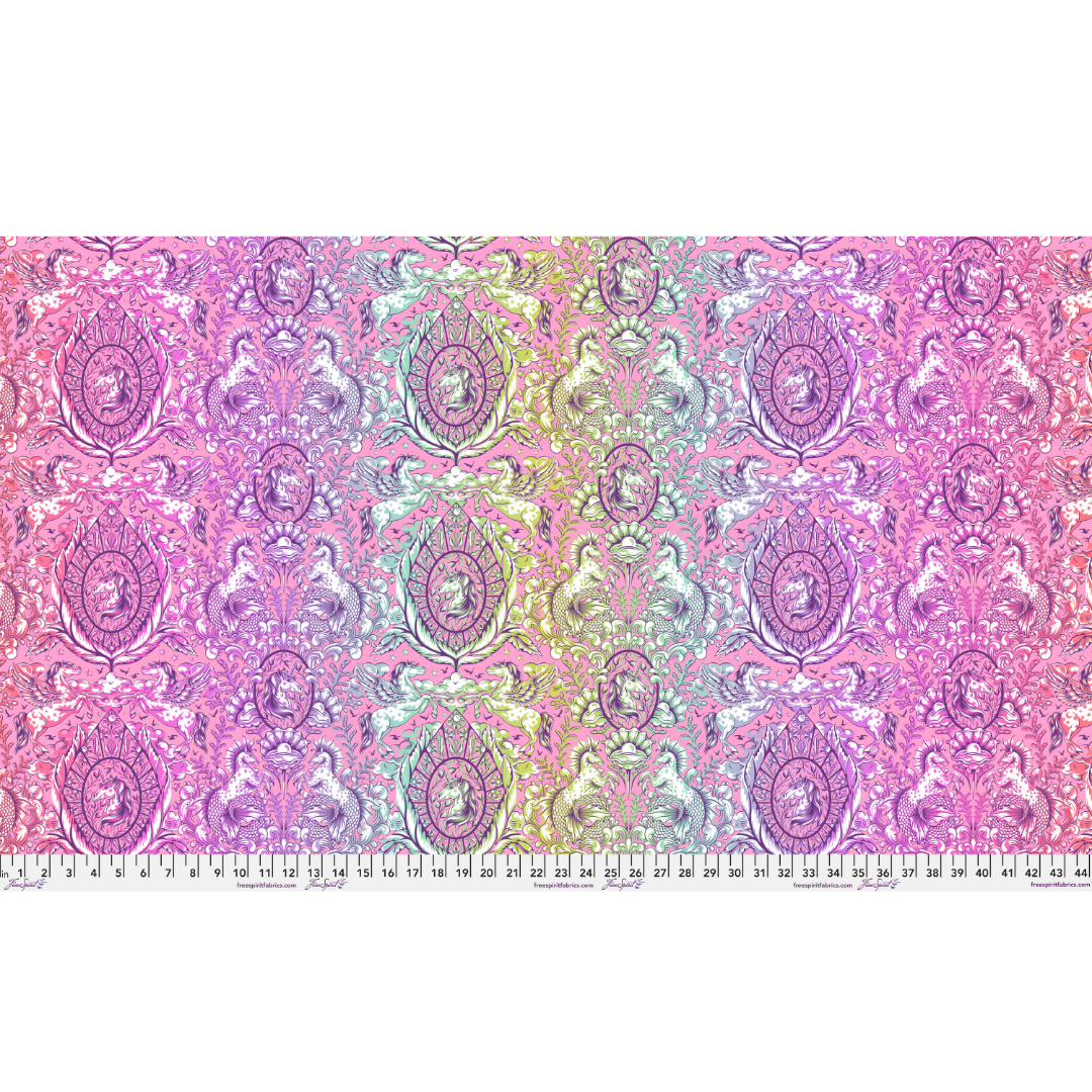 Patterned fabric with a ruler at the bottom on a white background